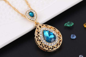 We Sell Fashion Costume Jewelry Aqua Color Stone Necklace w Faux Gold Trim w Matching Earrings