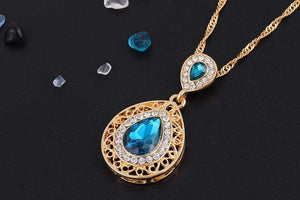 We Sell Fashion Costume Jewelry Aqua Color Stone Necklace w Faux Gold Trim w Matching Earrings